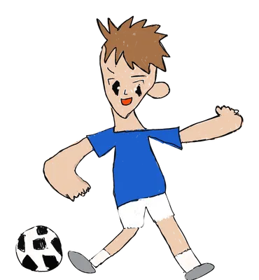 サッカーをする少年